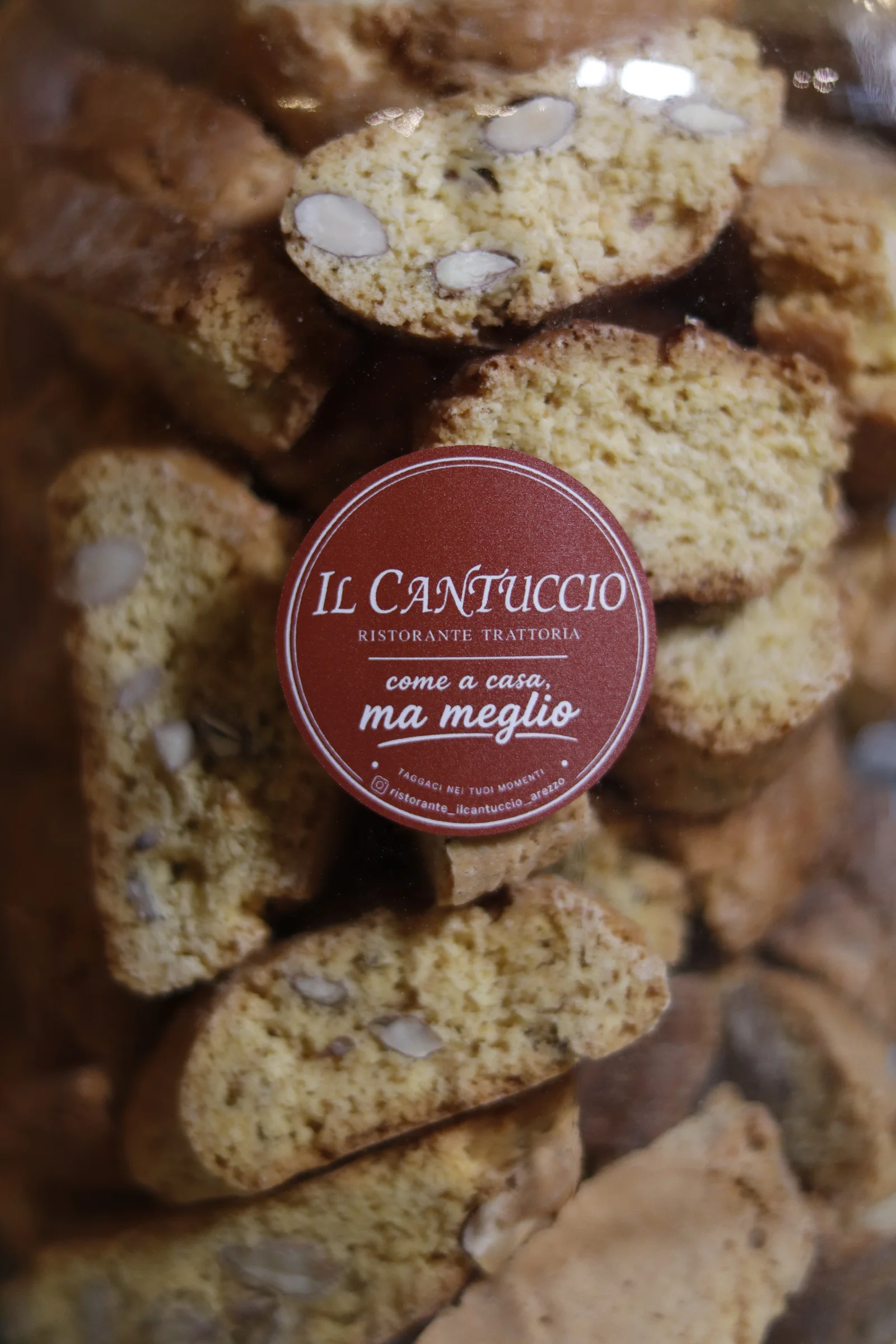 Traditional cantucci biscuits with the Il Cantuccio restaurant logo
