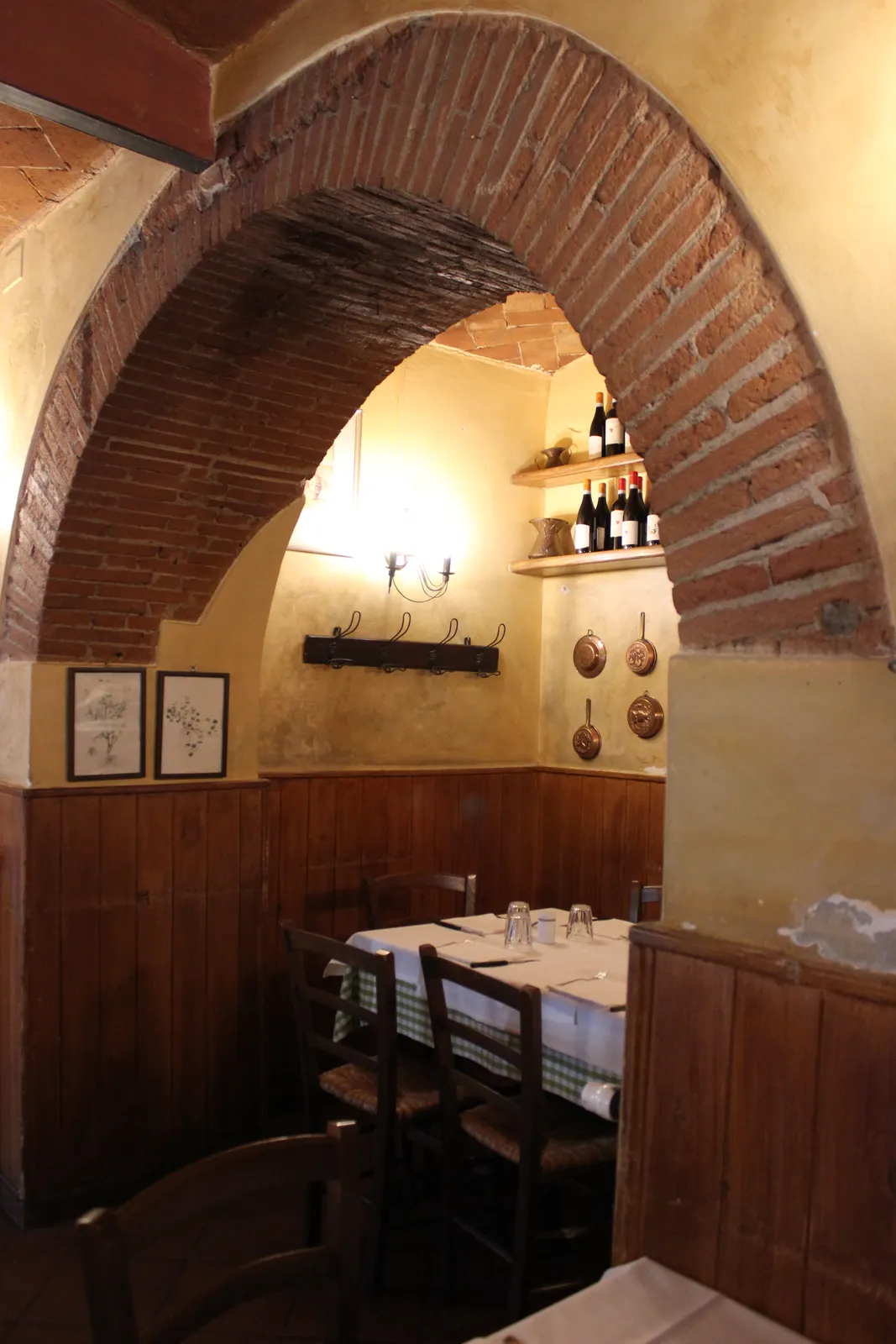 The dining room's brick arches